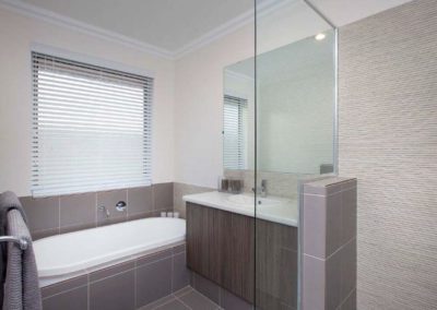 bathroom with venetian blinds