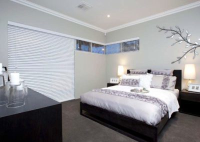 bedroom with large venetian blinds