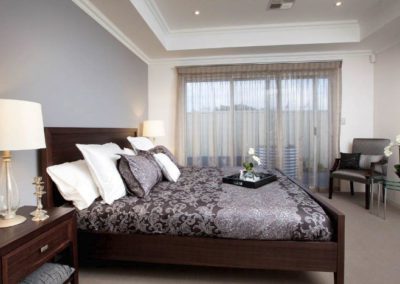 bedroom with sheer curtains