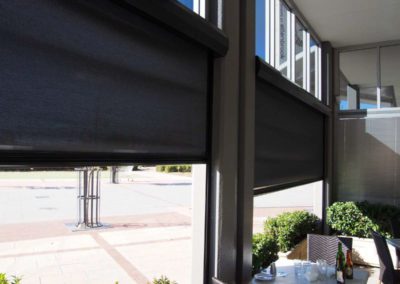 black Ziptrak blinds halfway down