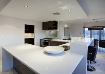 clean kitchen with sheer curtains