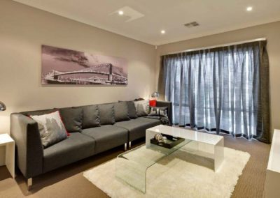 living room with grey sheer curtains