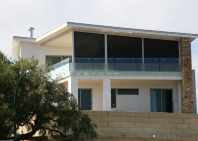 outdoor blinds on second story