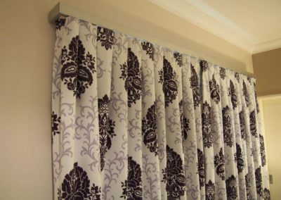 purple damask curtain detail