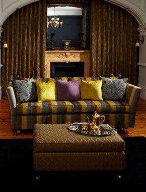 rich toned living room with brown curtains