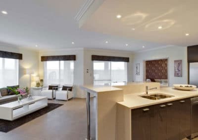 sunscreen roller blinds in open home