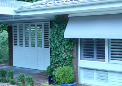 white indoor outdoor shutters