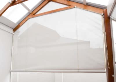 white rope and pulley blinds